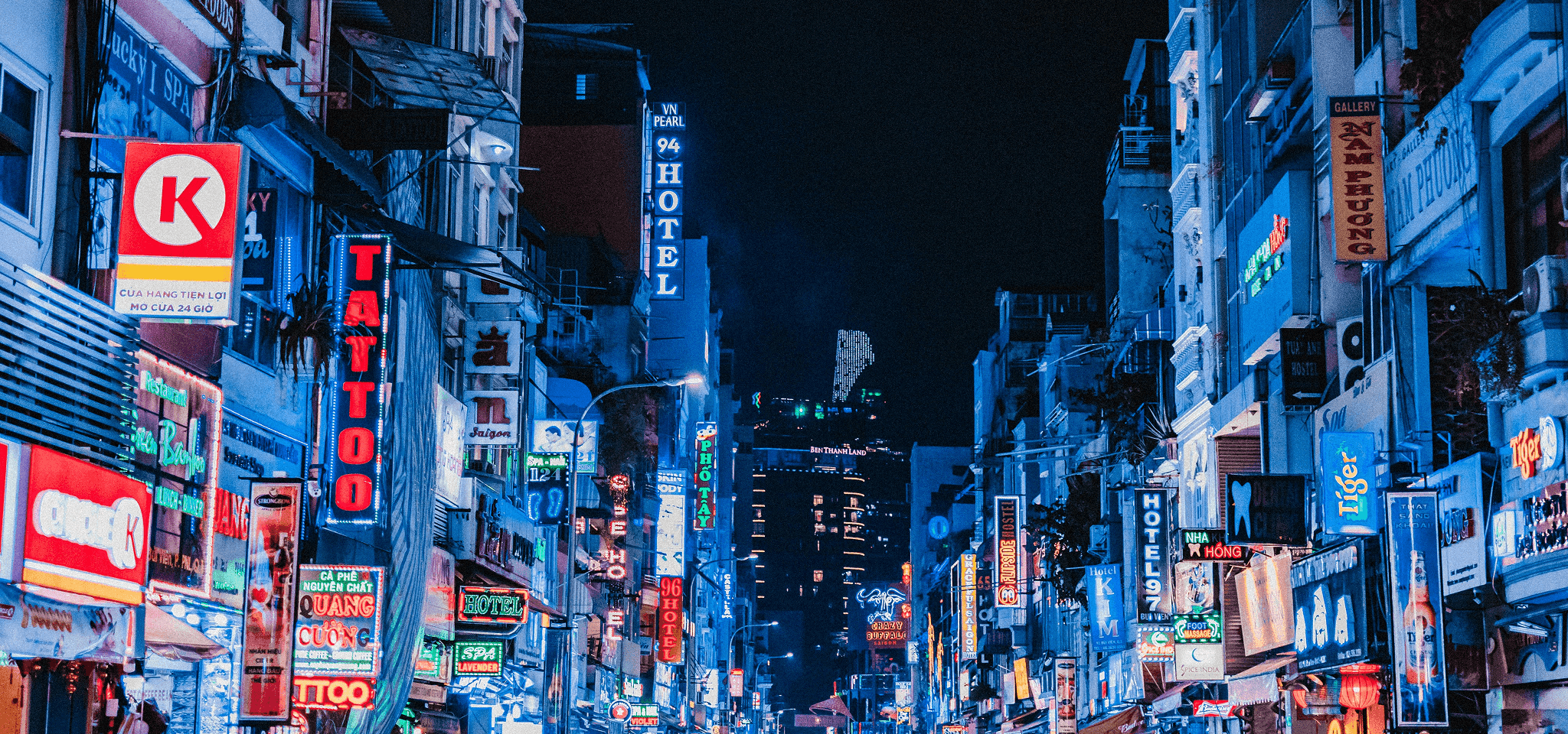 photography section cover image: a street at night in saigon