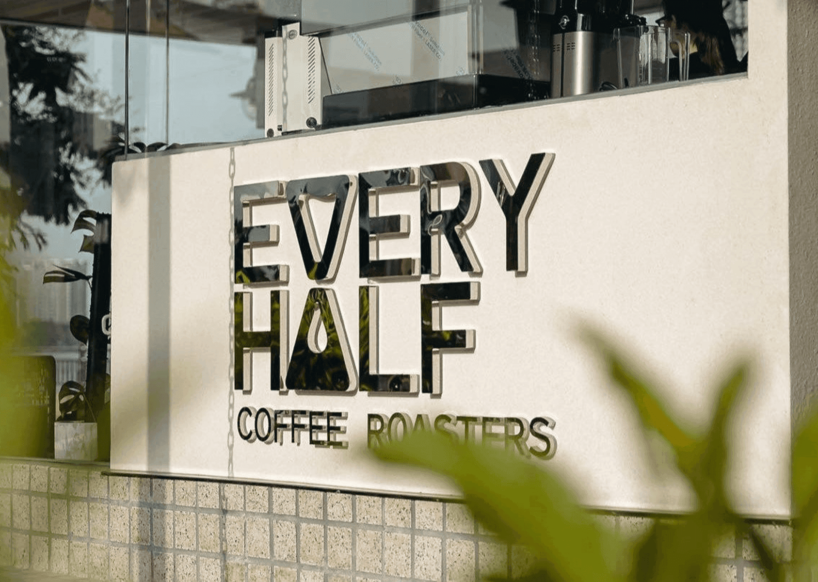 Every Half coffee brand name sign